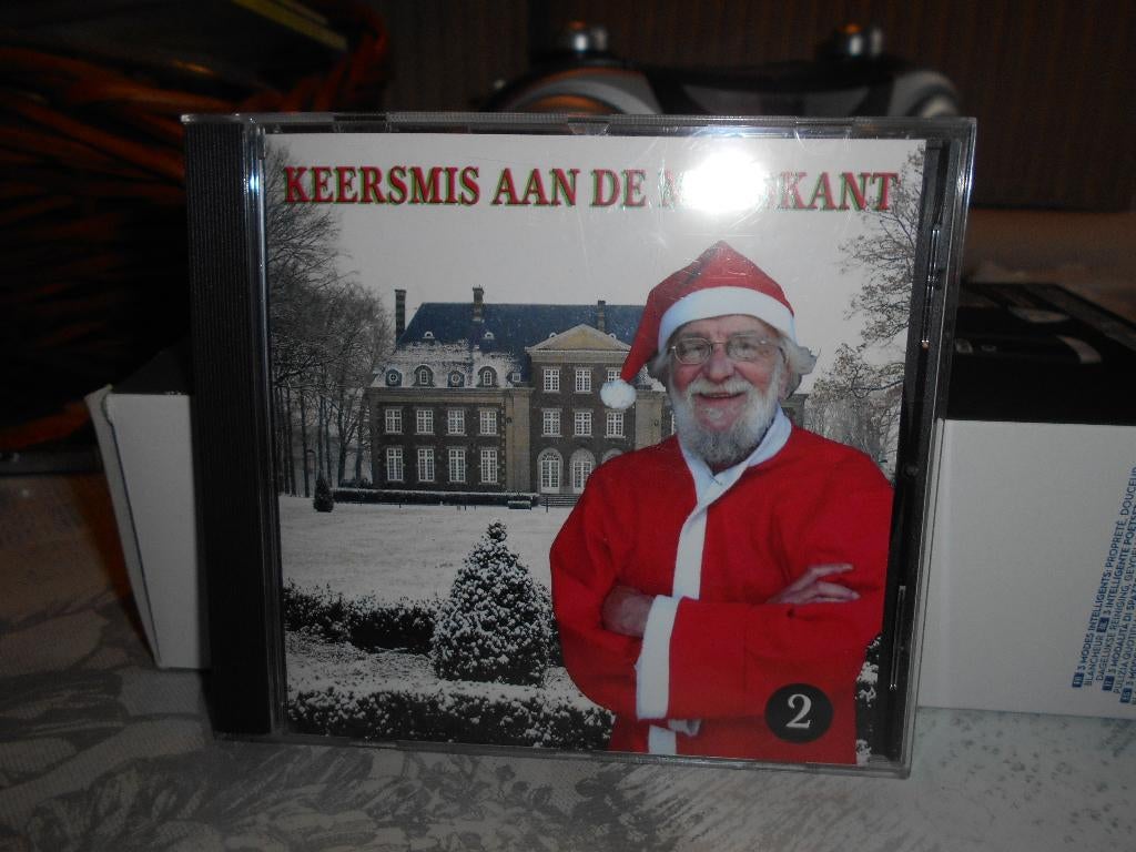 Keersmis aan de maaskant, Ophalen of Verzenden, Zo goed als nieuw, Levenslied of Smartlap