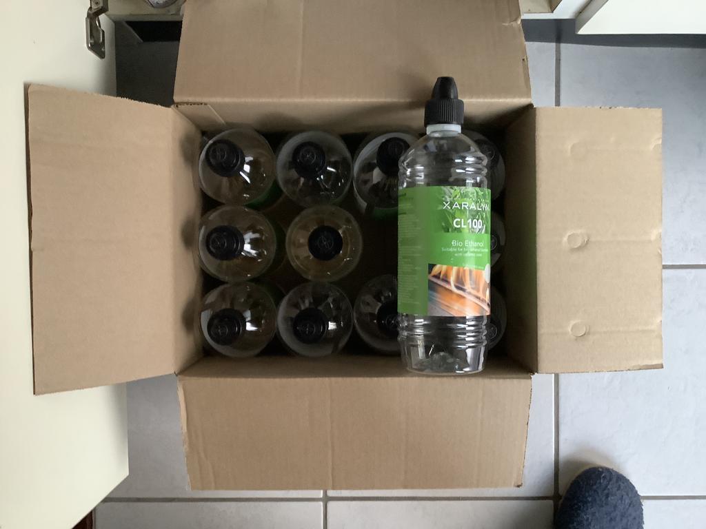 Doos met 12 lege litersflessen, Ophalen of Verzenden