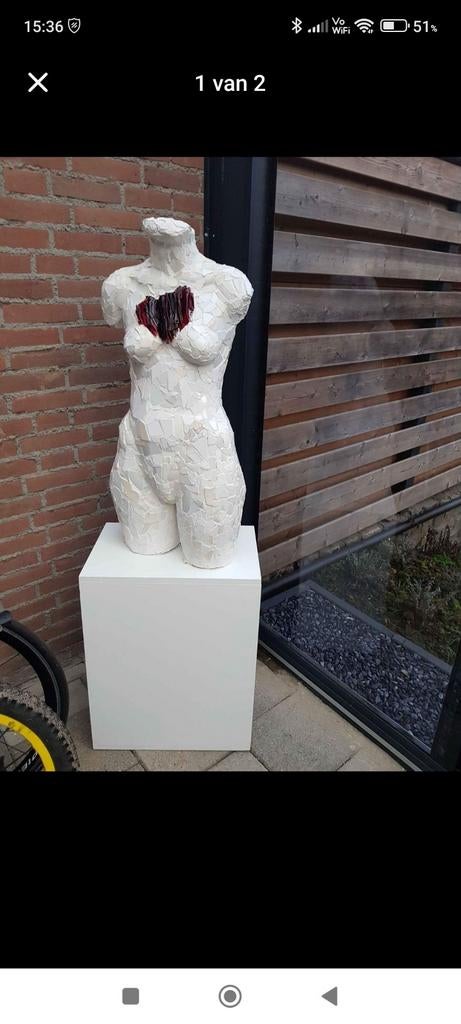 Torso beeld op sokkel, Ophalen