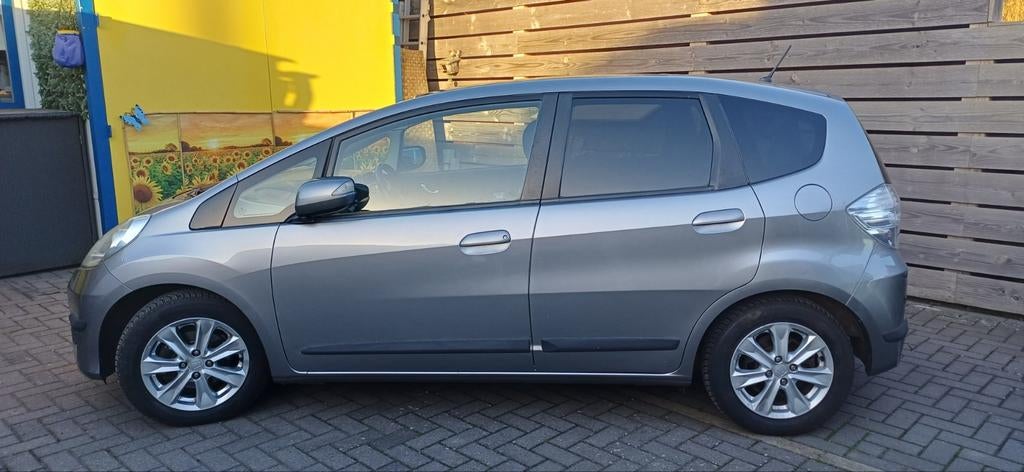 Honda Jazz 1.4 I-vtec 102pk CVT 2011 Grijs, Auto's, 4 cilinders, 49 €/maand, Origineel Nederlands, 22 km/l