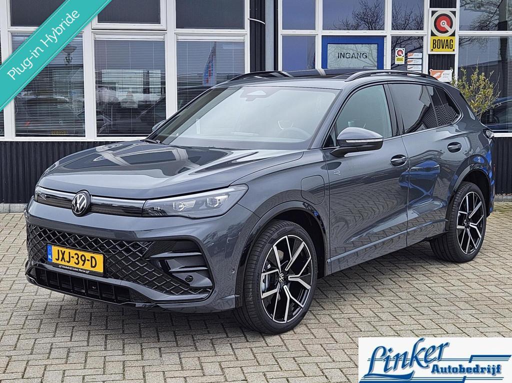 Volkswagen Tiguan 1.5 eHybrid R-Line 272PK BLACK LINE NIEUW!, Stof, 4 cilinders, Met garantie (alle), Adaptive Cruise Control