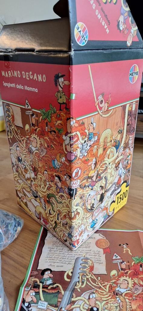 Marino Degano Spaghetti della Mamma Heye Puzzel - Nieuw!, Hobby en Vrije tijd, Denksport en Puzzels, Ophalen of Verzenden, 500 t/m 1500 stukjes