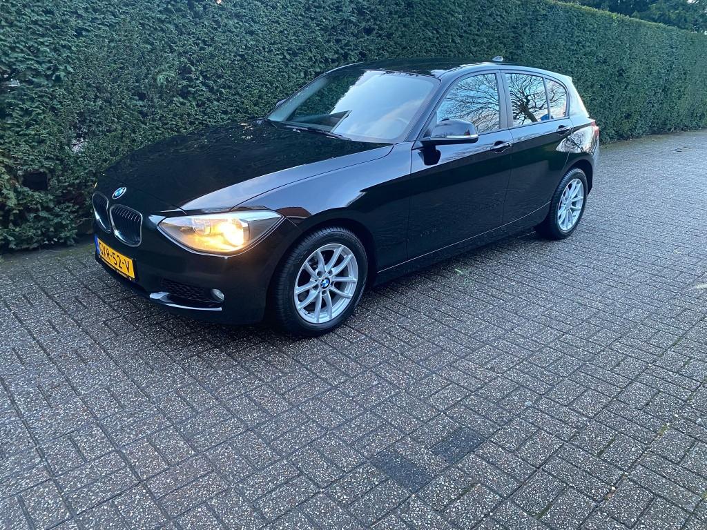 BMW 1-serie 116i Executive (bj 2015, automaat), Gebruikt, 4 cilinders, Origineel Nederlands, 1200 kg