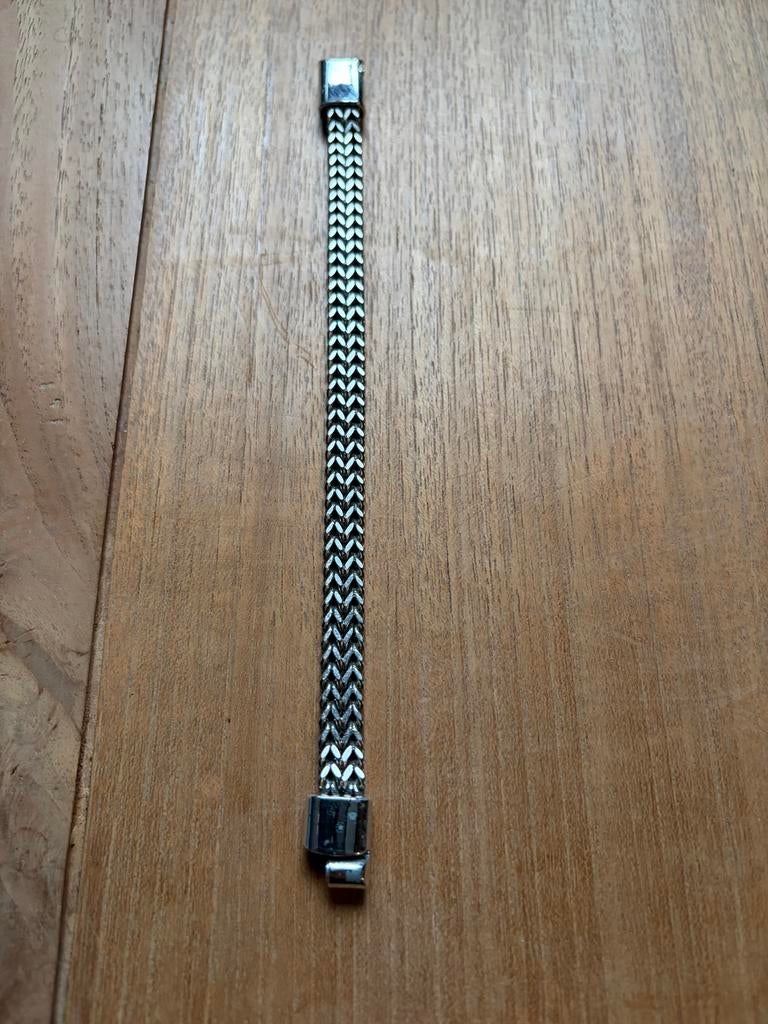 Zilverkleurige schakelarmband, Ophalen of Verzenden, Zo goed als nieuw, Zilver, Staal