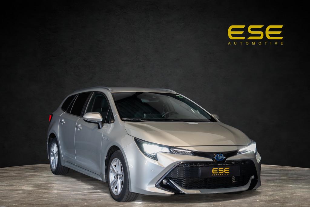 Toyota Corolla 1.8 Hybrid Business Plus | Navigatie | Camera, Stof, Gebruikt, Euro 6, Corolla
