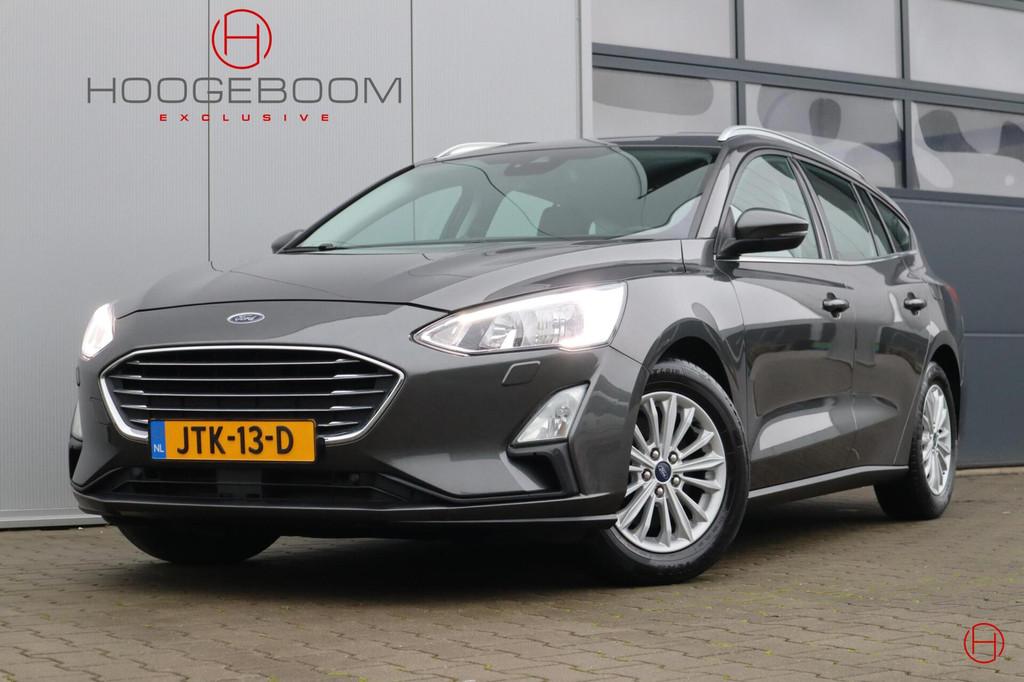 Ford Focus 1.0 125 PK Titanium / Clima / Cruise / Stoelverwa, Gebruikt, Zwart, Handgeschakeld, Lichtsensor