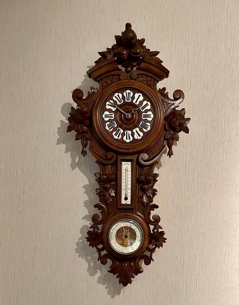 Hangklok met noten wijzerplaat ingelegd met parelmoer, Ophalen