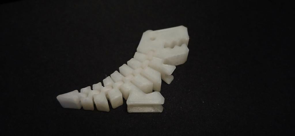 Flexi dino sleutelhanger, Verzamelen, Sleutelhangers, Ophalen of Verzenden, Zo goed als nieuw, Knuffel of Figuurtje