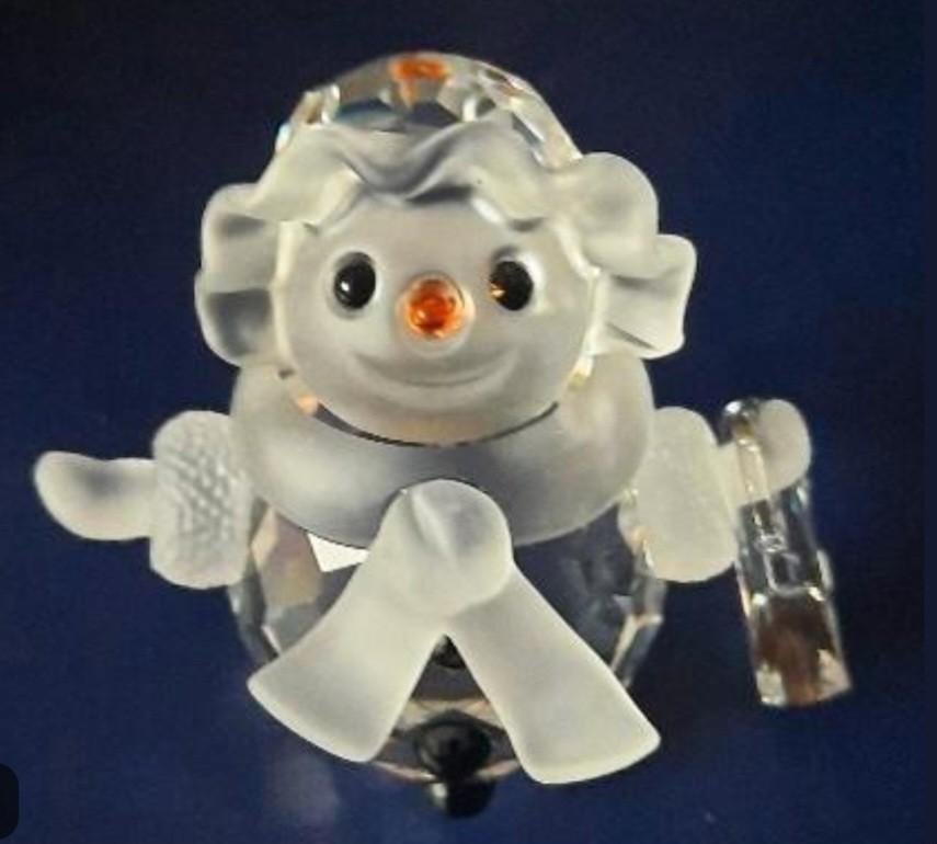 Swarovski Sneeuwvrouw met tas, Ophalen of Verzenden, Nieuw, Sieraad of Horloge