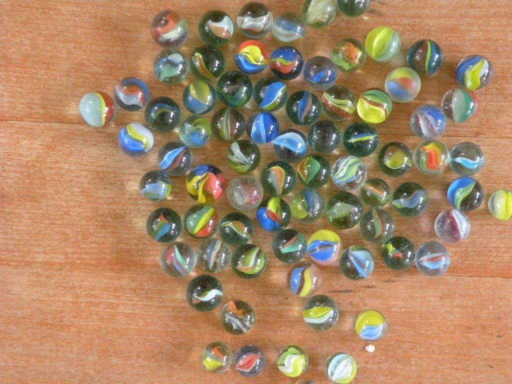 Knikkers, doorzichtig glas met 3 kleurtjes erin., Antiek en Kunst, Antiek | Speelgoed, Ophalen of Verzenden