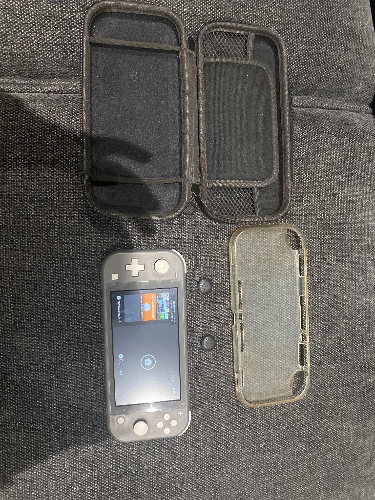 Nintendo switch light, Ophalen of Verzenden, Grijs, Zo goed als nieuw