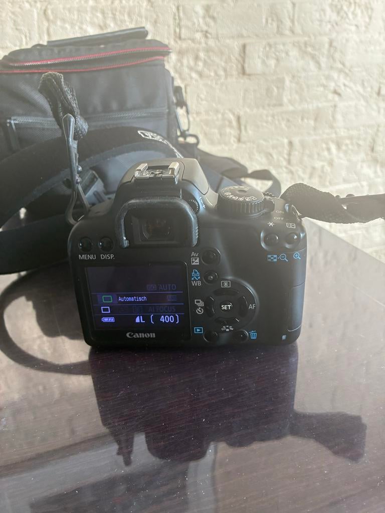 Canon EOS 1000D Spiegelreflexcamera met lens en tas, Gebruikt, Spiegelreflex, Canon, Ophalen of Verzenden