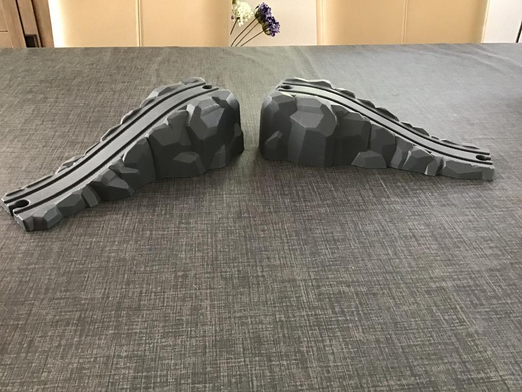 Treinbaan rotsberg weg/ viaducht, Ophalen