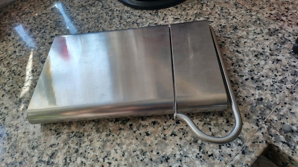 Kaas snijder voor zachte kazen, Ophalen