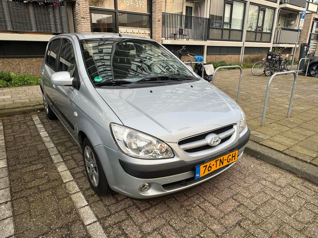 Hyundai Getz 1.4 5DRS AUT 2006 Grijs, 40 €/maand, 4 cilinders, Origineel Nederlands, Grijs