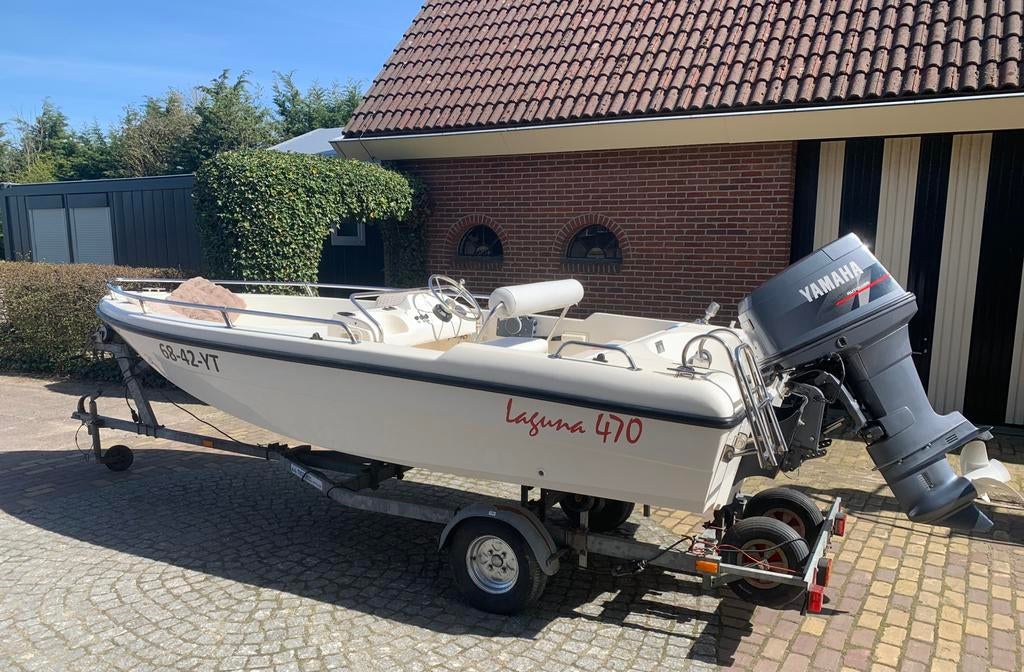 Laguna 470 consoleboot 80pk Yamaha Autolube freewheel traile, Watersport en Boten, Vis- en Consoleboten, Zo goed als nieuw, Ophalen