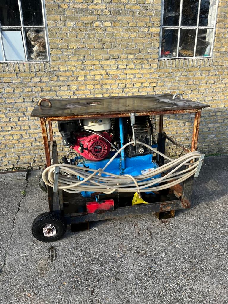 Mobiele compressor Honda GX benzine bouw in transport krat, 100 liter of meer, Ophalen of Verzenden, Gebruikt, Mobiel