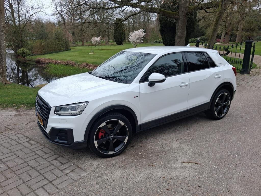 Audi Q2 1.4 Tfsi CoD 149pk S Tronic 2018 Wit, Auto's, Audi, 4 cilinders, Leder en Stof, Wit, 1500 kg