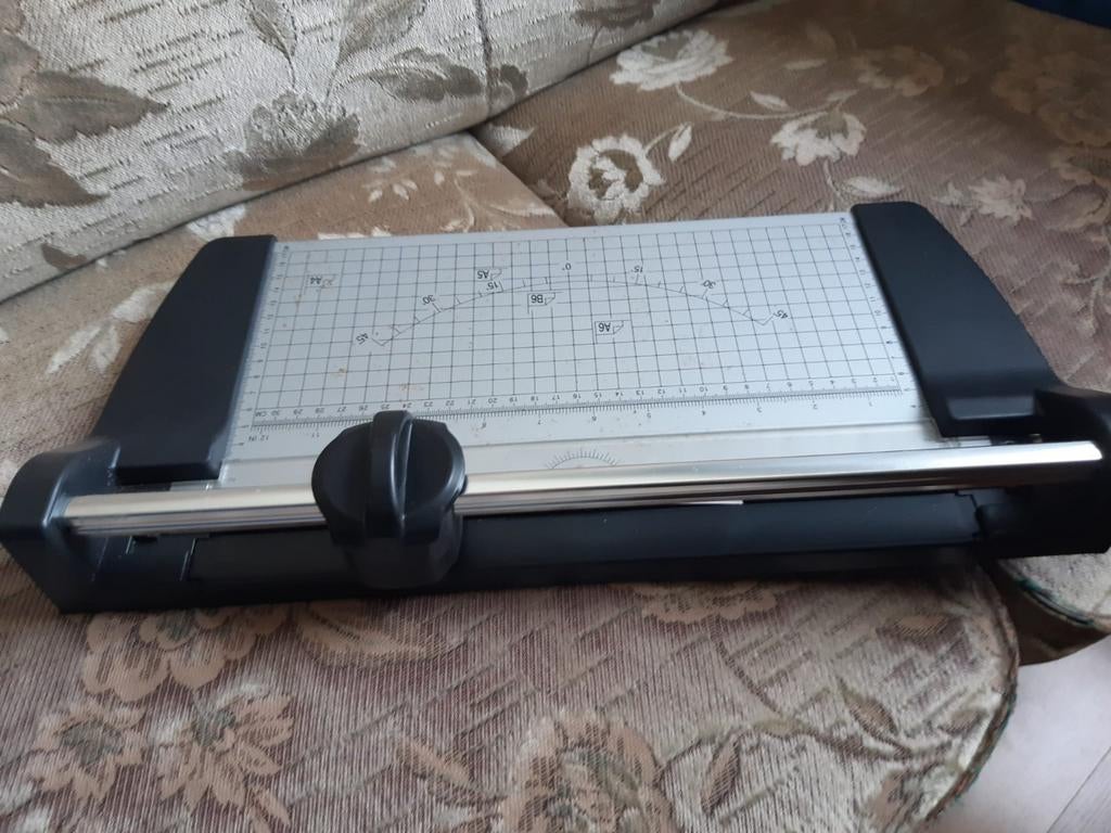 A4 papiersnijder., Ophalen