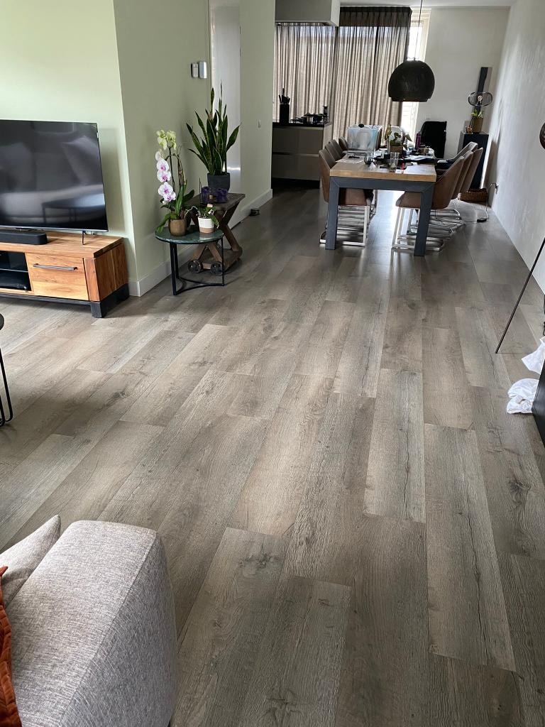 Laminaat bruin/grijs ongeveer 55 m2, Ophalen, Gebruikt, 50 tot 150 cm, 10 m² of meer