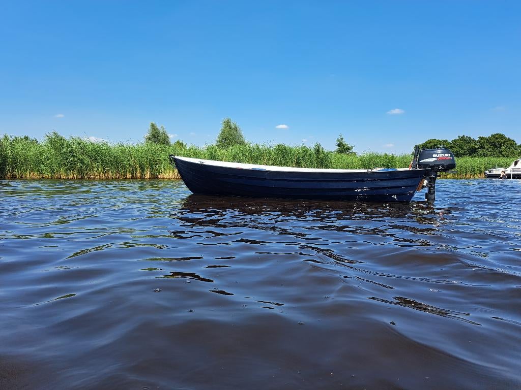 Nette polyester boot 4,10m met zonnedek en Suzuki 6PK 4takt, Watersport en Boten, Motorboten en Motorjachten, Ophalen, Gebruikt