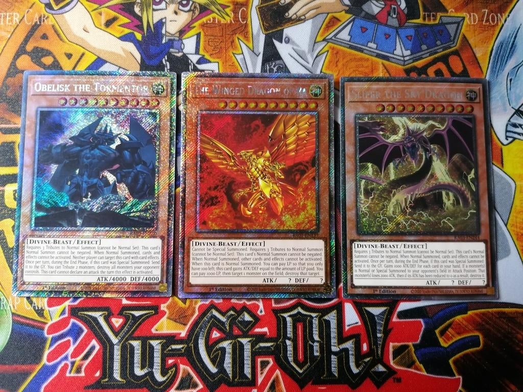 Egyptian God Set - Platinum Secret Rare RA03 - Yu-Gi-Oh, Ophalen of Verzenden, Zo goed als nieuw, Meerdere kaarten, Foil