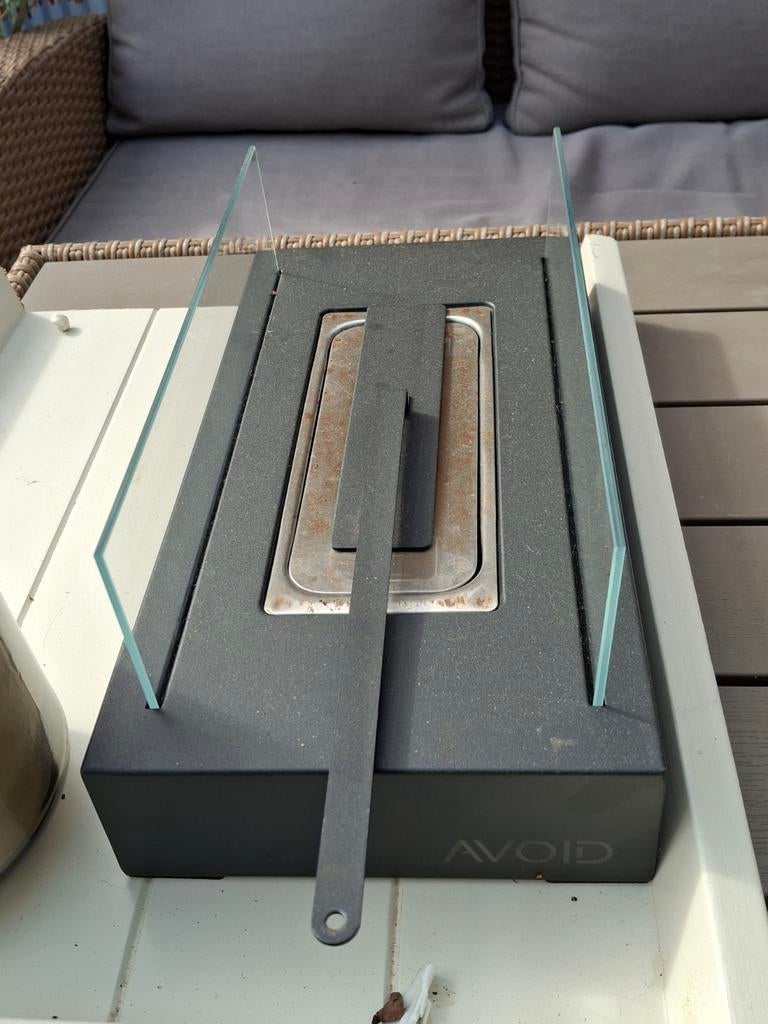 Tafel haard met olie, Ophalen