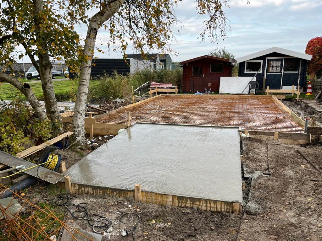 Stalen buispalen heipalen fundering beton grondafvoer  Heien