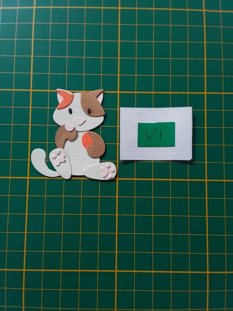 V1 Stansjes witte lapjes kat met oranje en bruine vlekken, Ophalen of Verzenden, Nieuw, Kerst, Overige typen