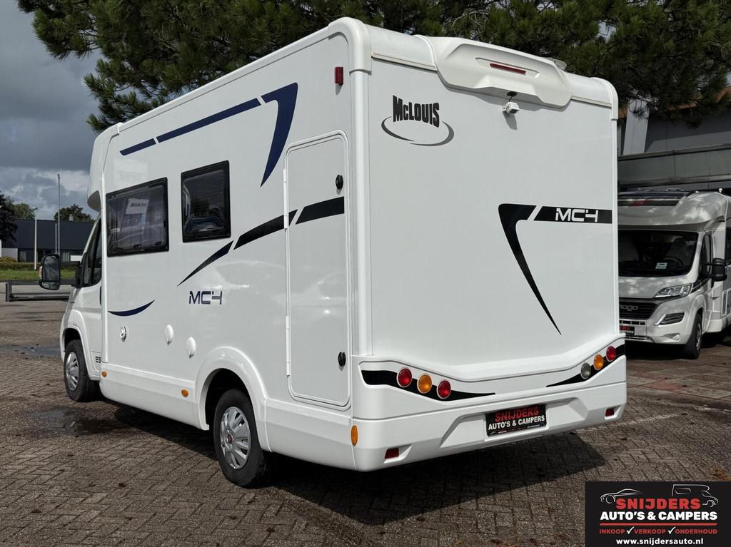 Mc louis mc4 237 met maar 7700 km face to face, Caravans en Kamperen, Campers, Airconditioning, Bedrijf, 6 tot 7 meter, Half-integraal