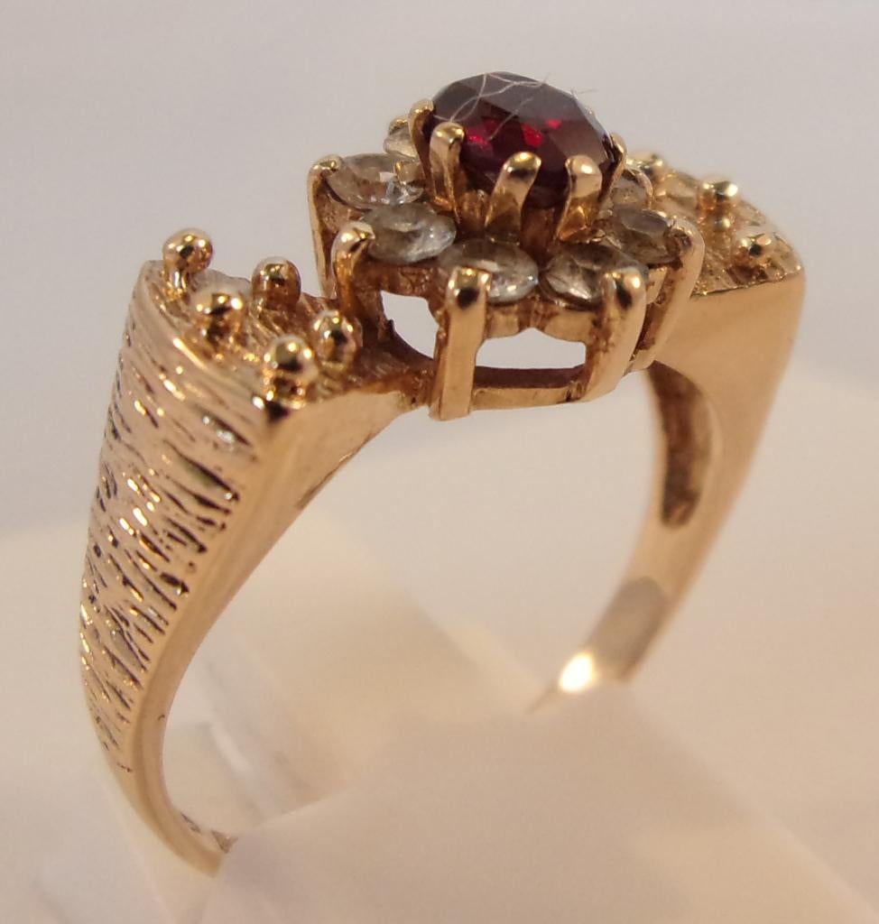 Vintage gouden strikring met Topaas en Granaat, Verzenden, Goud, Ring, Met edelsteen