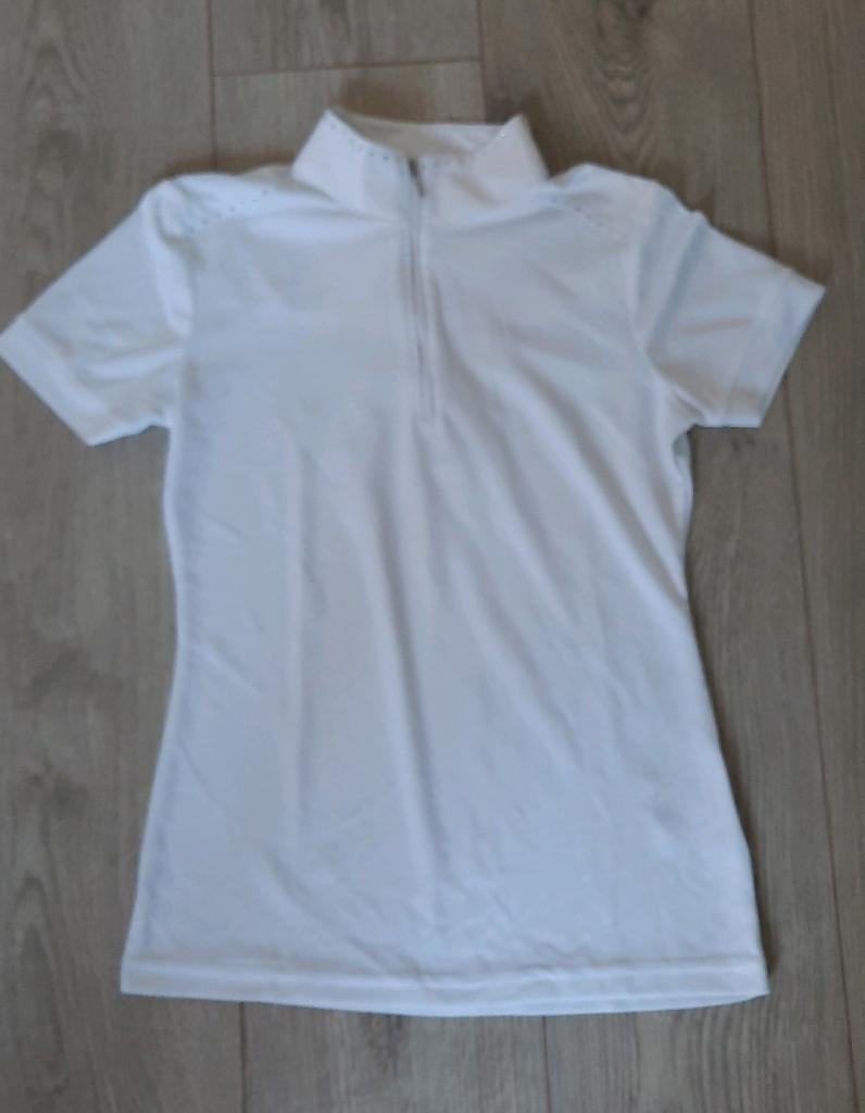 Wedstrijd shirt paardrijden maat 164.
Maar 1x gedragen., Ophalen of Verzenden, Zo goed als nieuw, Maat 34 (XS) of kleiner, Korte mouw