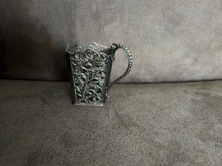 houder voor maggi fles, Ophalen