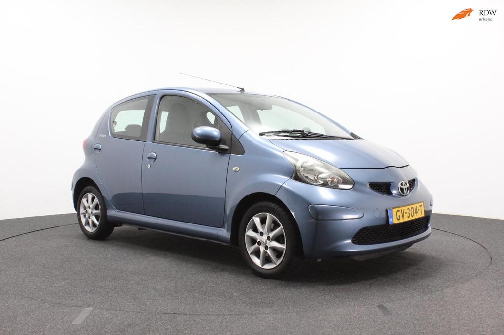 Toyota Aygo 1.0-12V Dynamic Blue | Airco | Half leer | Sport, Voorwielaandrijving, Gebruikt, 68 pk, Bedrijf