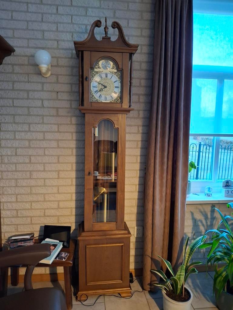 Nette tempus fugit klok staande, Ophalen