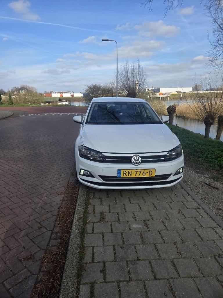Volkswagen Polo 1.0 TSI 70KW 5D handgeschakeld 2018 Wit, Voorwielaandrijving, Euro 5, Stof, 40 €/maand