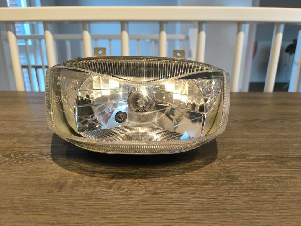 Aprilia SR 50 Koplamp Stealth WWW, Ophalen of Verzenden, Koplamp, Aprilia