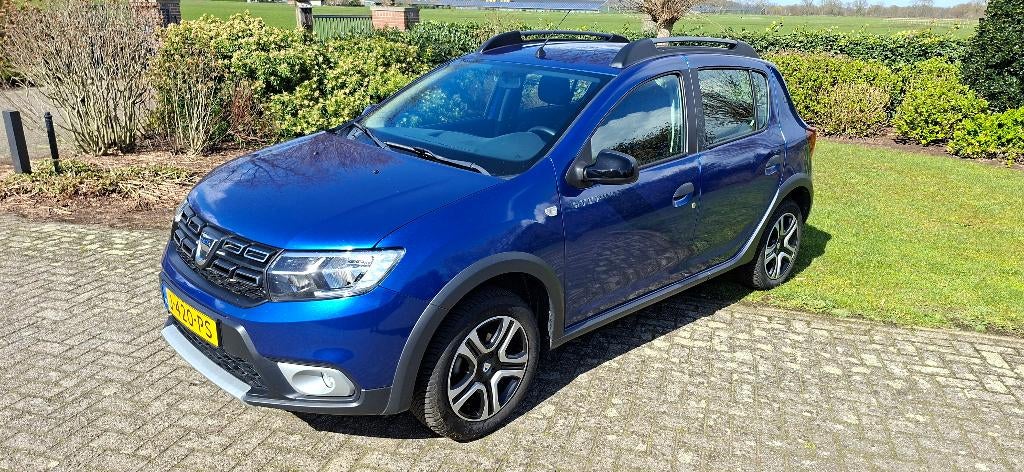 Dacia Sandero 1.0 TCe 100pk G3 -gas  SERIE LIMITEE 15 TH, Stof, 580 kg, Metallic lak, Blauw