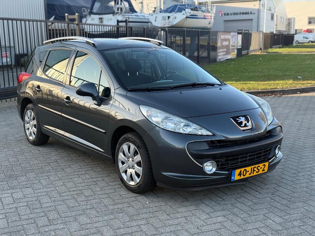 Peugeot 207 SW 1.4 VTi XS | 2009 | Airco | APK 15-10-2026, Auto's, Peugeot, Stof, Zwart, Origineel Nederlands, Handgeschakeld