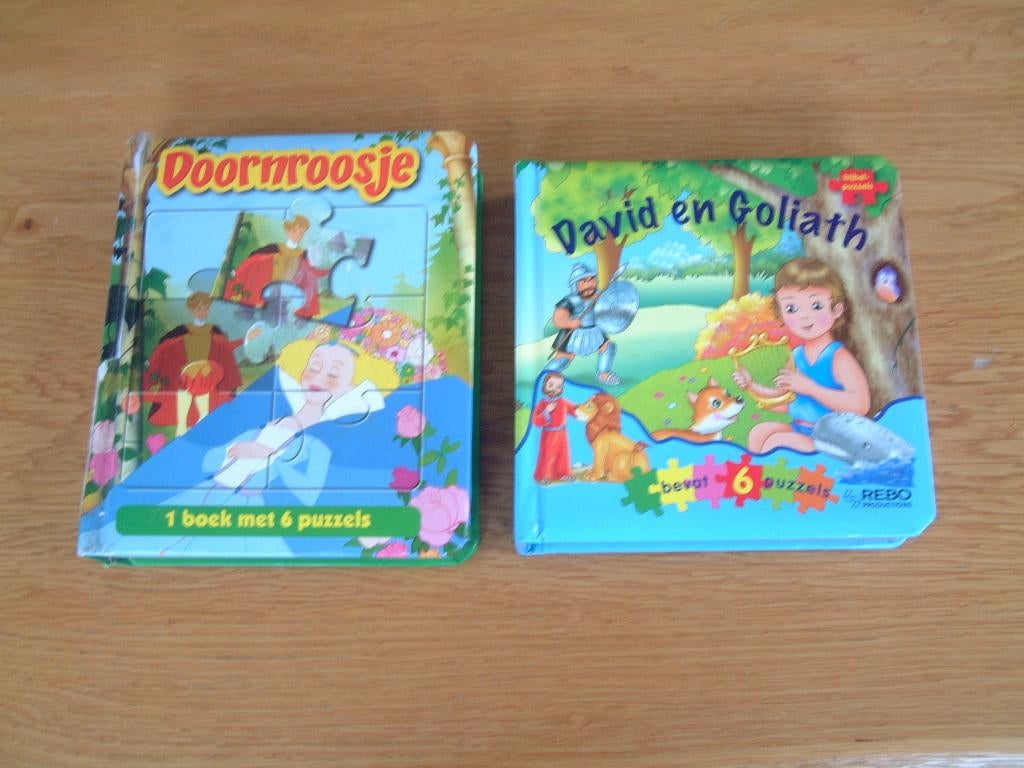2 kleuter puzzel leesboek David en Goliath en Doornroosje, Ophalen of Verzenden, Gelezen, Fictie algemeen
