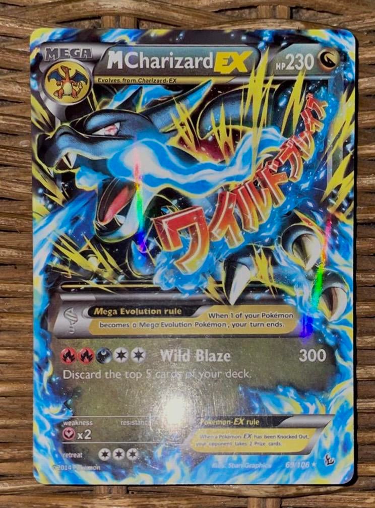 Super RARE M Charizard EX PSA 9, Ophalen of Verzenden, Zo goed als nieuw