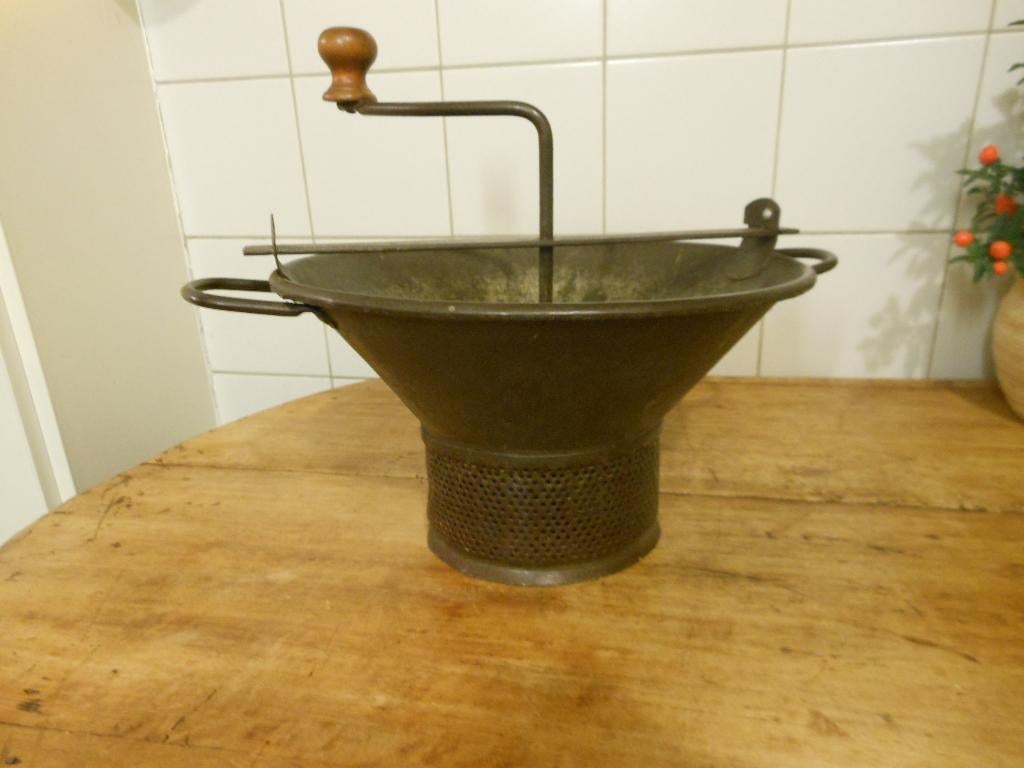 oud ijzere draai zeef, Ophalen