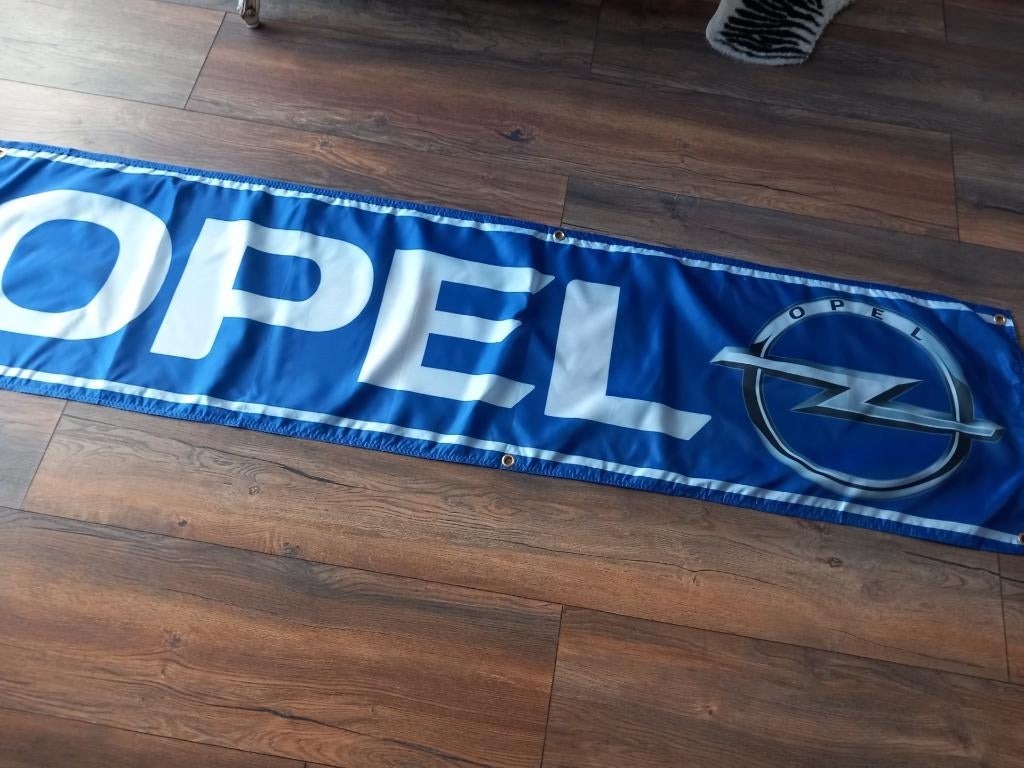 0PEL BANNER 45X 180 MET BEVESTIGGINGS OGEN MOOIE KLEUR, Ophalen of Verzenden, Nieuw