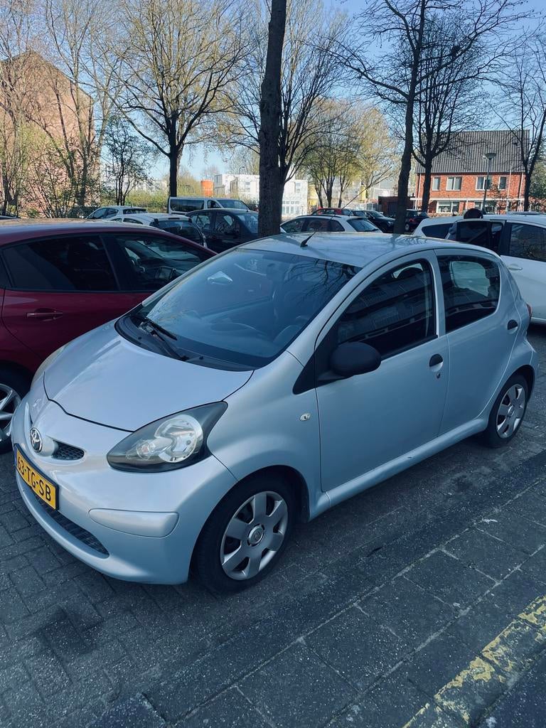 Toyota Aygo 1.0 12V Vvt-i 5DRS 2006 Blauw, Auto's, Voorwielaandrijving, Airbags, 68 pk, Origineel Nederlands