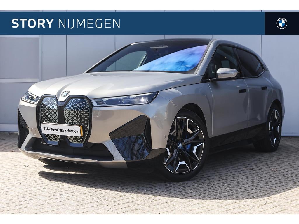 BMW iX xDrive40 High Executive / Sportpakket / Trekhaak / Pa, Start-stop-systeem, Gebruikt, Met garantie (alle), 24 min