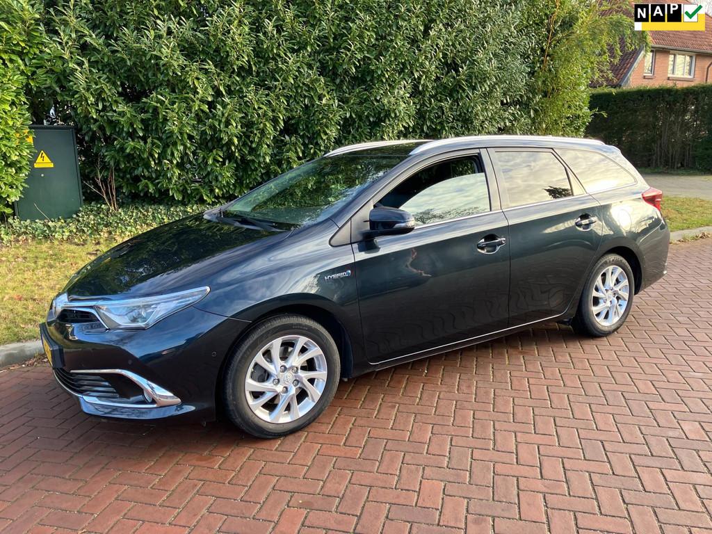 Toyota Auris Touring Sports 1.8 Hybrid Lease pro vele opties, Gebruikt, Blauw, Leder en Stof, Origineel Nederlands