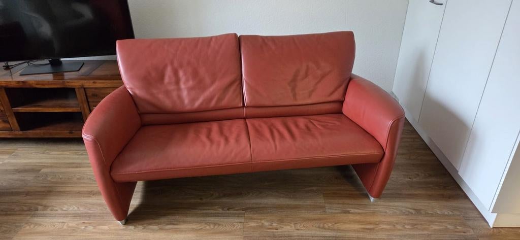 Jori tweezitsbank in oranje bruin leer, Ophalen, 150 tot 200 cm, Tweepersoons, Zo goed als nieuw