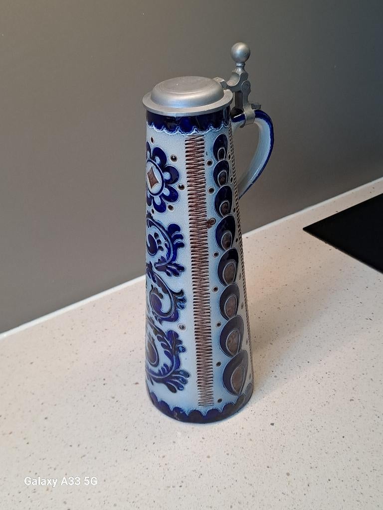 Bierkan met tinnen deksel, Ophalen