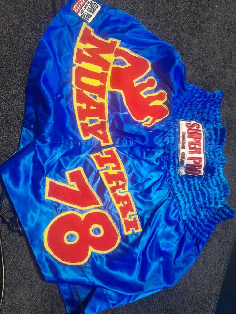 Kickbox  broekje, Ophalen