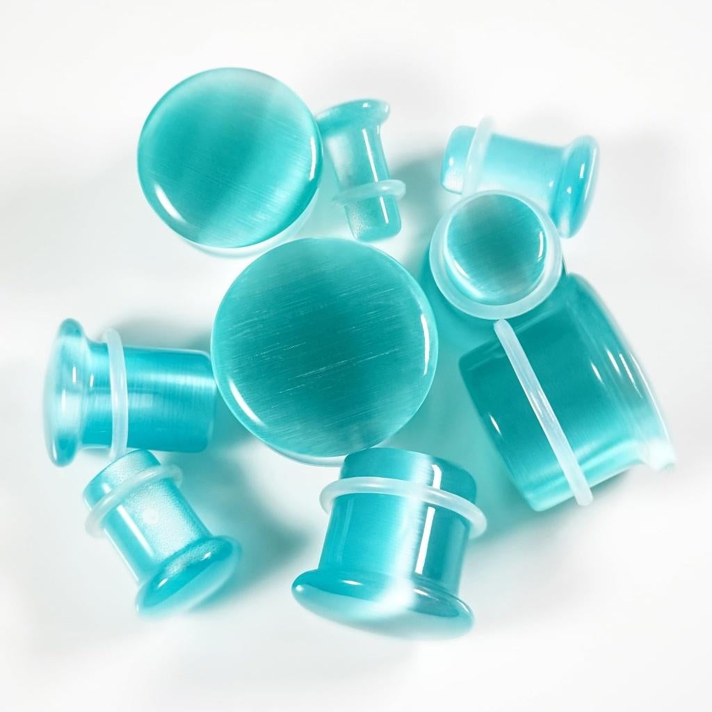 Licht groene glazen plug (single flared), Sieraden, Tassen en Uiterlijk, Piercings, Verzenden, Nieuw, Overige materialen, Oor- of Traguspiercing